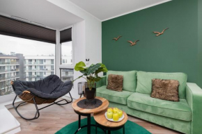 Green Apartment in Gdańsk with Free Access to the Gym and Parking by Noclegi Renters